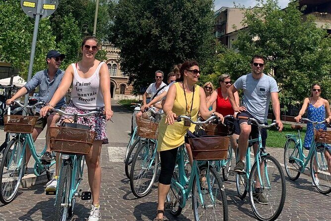 Highlights and hidden gems Verona Bike Tour - Porta Borsari and Piazza delle Erbe: Roman gate to market square