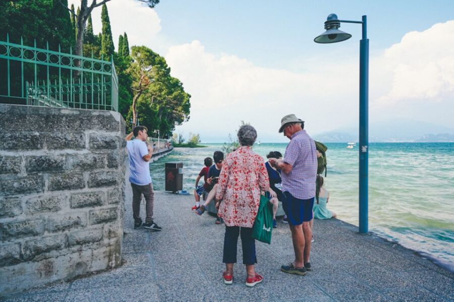 Sirmione: Lake Garda Boat, Grotte di Catullo & Walking Tour - Walking Sirmione’s streets: old lanes, thermal-town atmosphere, and gelato time