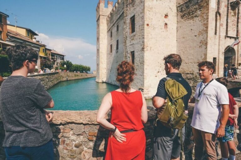 Sirmione: Village Highlights Walking & Lake Garda Boat Tour - Meeting point and timing: the yellow sign is your friend