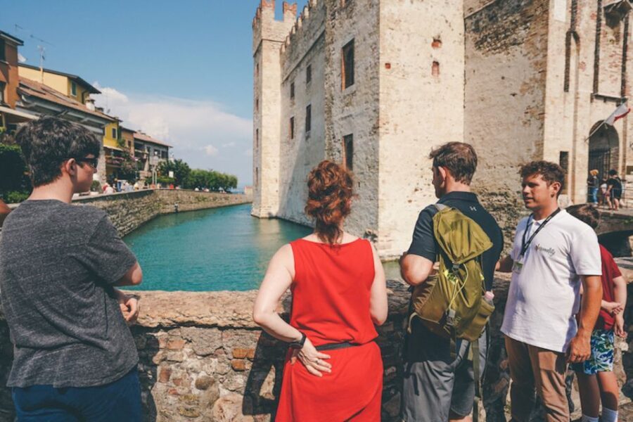 Sirmione: Village Highlights Walking & Lake Garda Boat Tour - Meeting point and timing: the yellow sign is your friend