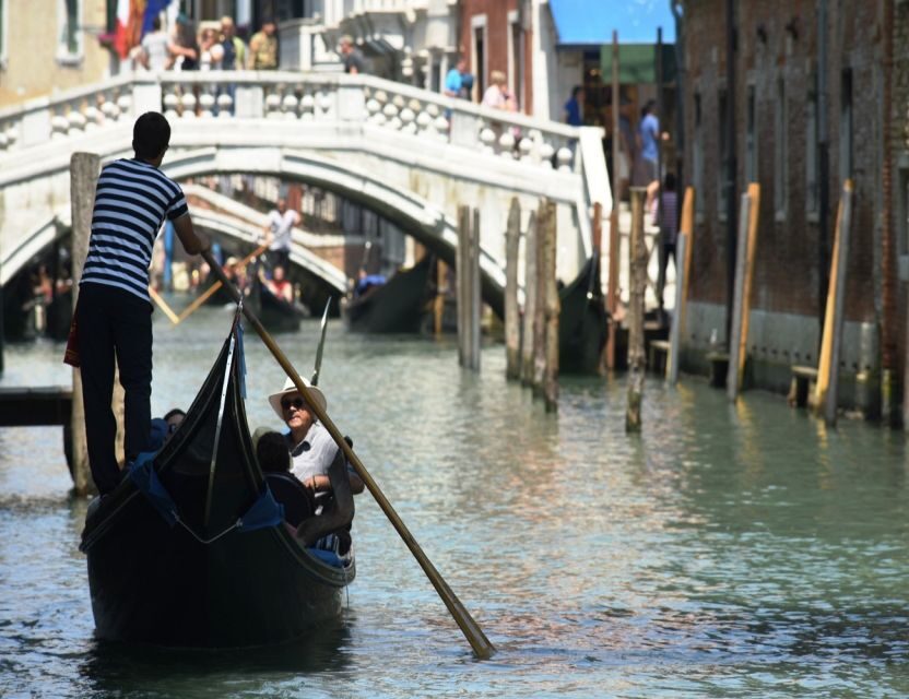 Venice: Shared Gondola Ride - Shared gondola reality: up to five, and the gondolier style varies
